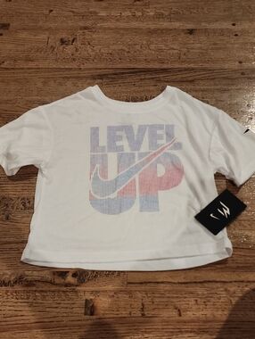 Nike White Short-Sleeve Tee with 'Level Up' Gradient Graphic